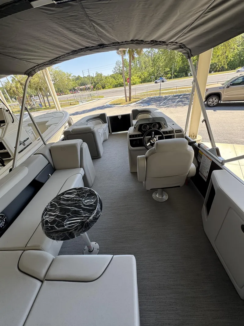 Slide: The Image of Interior of Sweetwater SW2086CSE pontoon boat, model year 2026. - 30