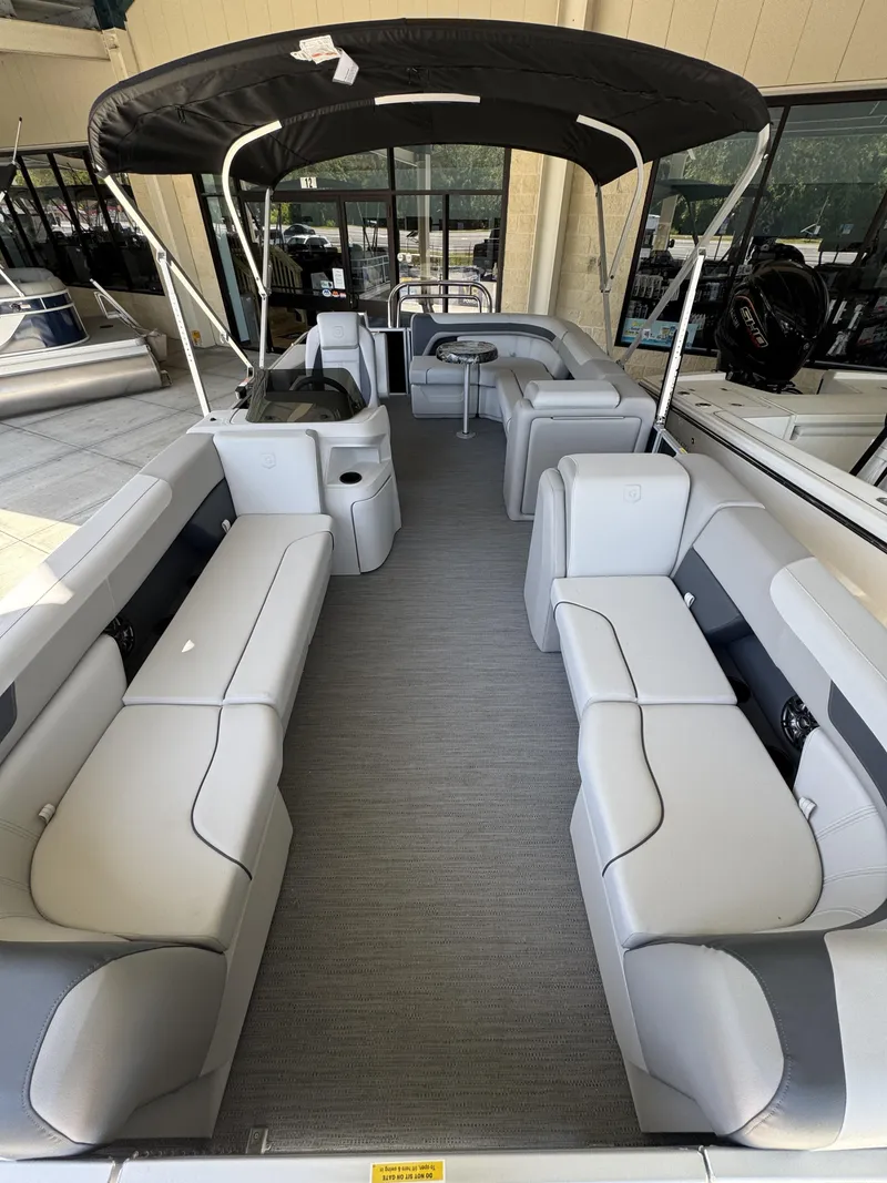 Slide: The Image of Interior view of Sweetwater SW2086CSE pontoon boat, model year 2026. - 7