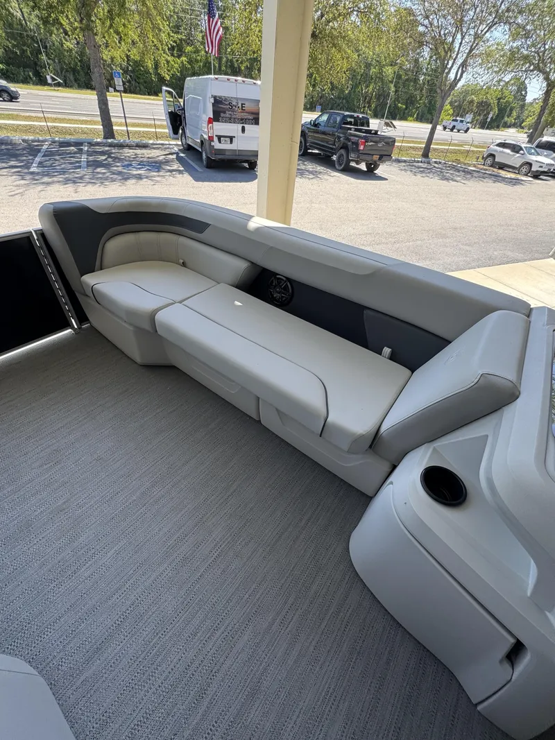 Slide: The Image of Interior of Sweetwater SW2086CSE boat, gray upholstery, model year 2026. - 8