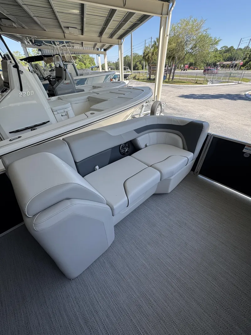 Slide: The Image of Luxurious Sweetwater SW2086CSE boat seating, 2026 model, under covered area. - 9