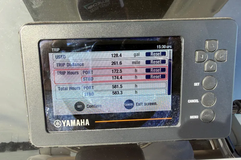 Slide: The Image of Yamaha display showing trip data on a 2021 Edgewater 262CC boat. - 31