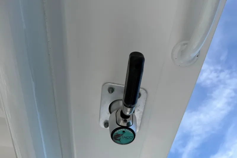 Slide: The Image of Edgewater 262CC 2021 boat lever against blue sky background. - 43