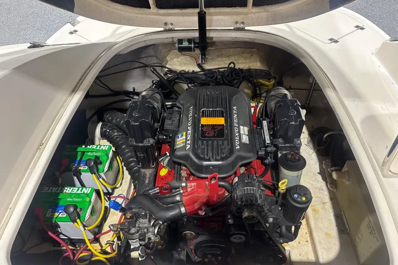 Slide: The Image of Engine compartment of a 2009 Chaparral 236 SSX with Volvo Penta motor and batteries. - 15