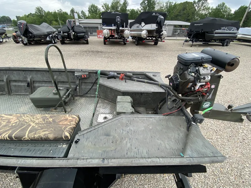 Slide: The Image of 2017 War Eagle 542FLD Sportsman boat with motor in a parking lot. - 8