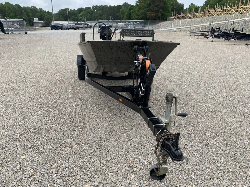 Slide: The Image of 2017 War Eagle 542FLD Sportsman on trailer, gravel lot. - 9