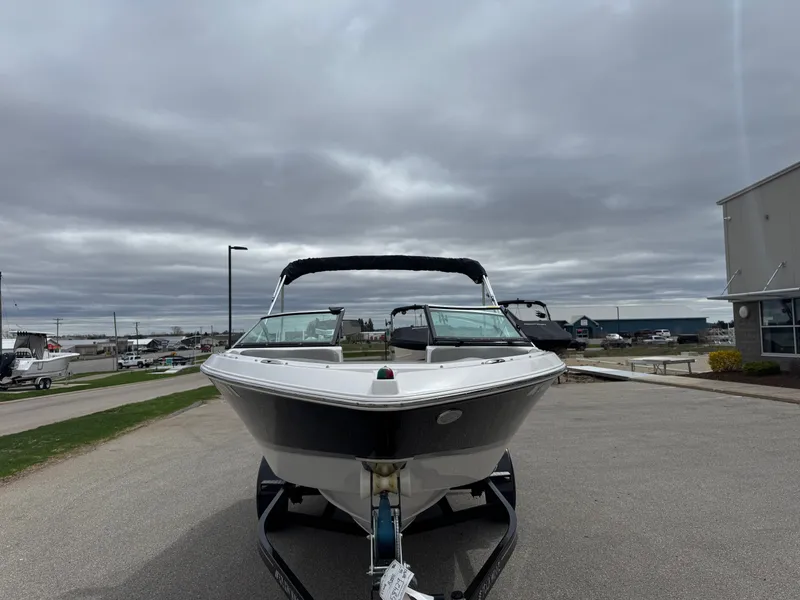 Slide: The Image of 2016 Four Winns 190 Horizon boat on trailer, cloudy sky. - 3