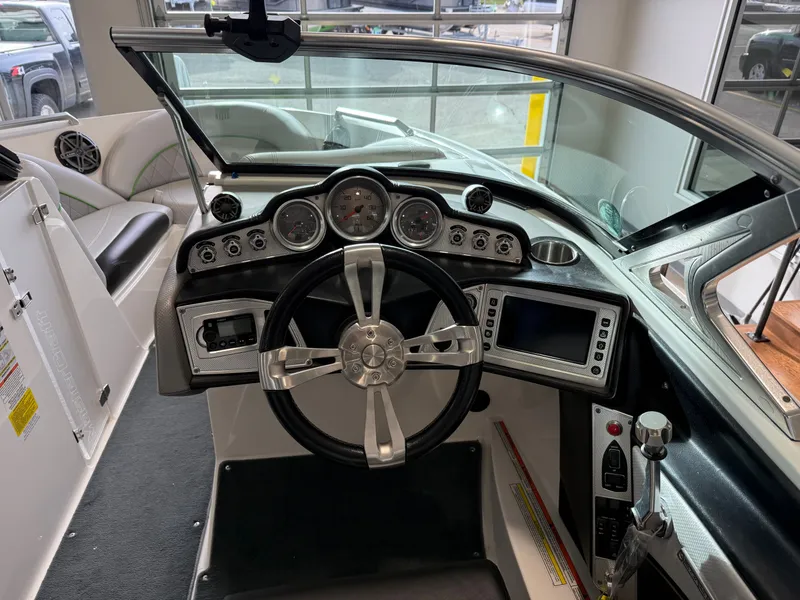 Slide: The Image of Interior view of 2015 MasterCraft X10 boat cockpit. - 12