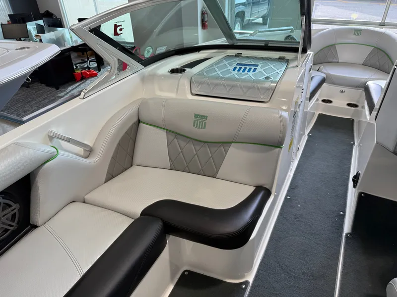Slide: The Image of Interior of a 2015 MasterCraft X10 boat with luxurious seating. - 14