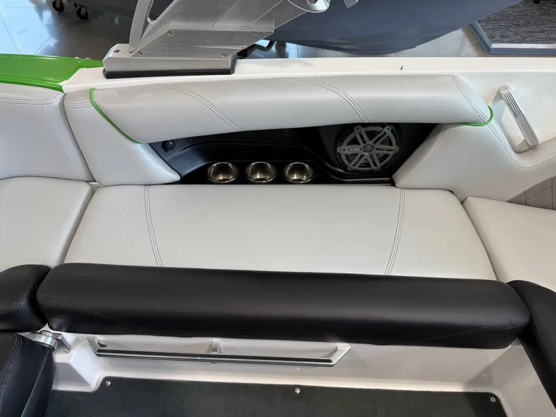 Slide: The Image of Interior of a 2015 MasterCraft X10 boat with speaker and cup holders. - 15