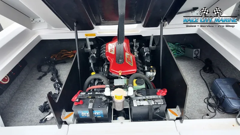 Slide: The Image of Engine compartment of a 2007 Correct Craft 236TE boat with battery. - 17