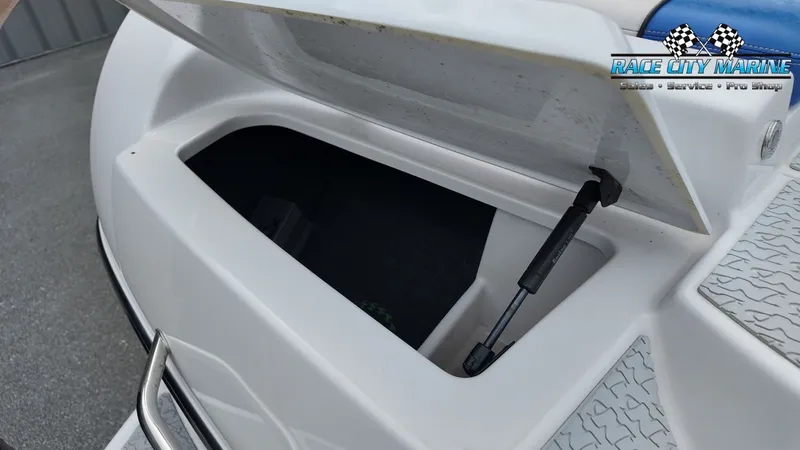 Slide: The Image of Open storage compartment in 2007 Correct Craft 236TE boat. - 20