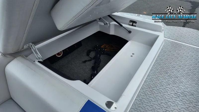 Slide: The Image of Storage compartment in 2007 Correct Craft 236TE boat. - 24