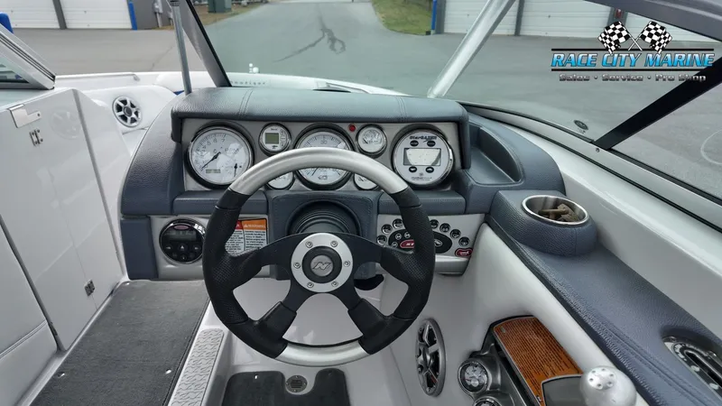 Slide: The Image of Interior view of a 2007 Correct Craft 236TE boat. - 26