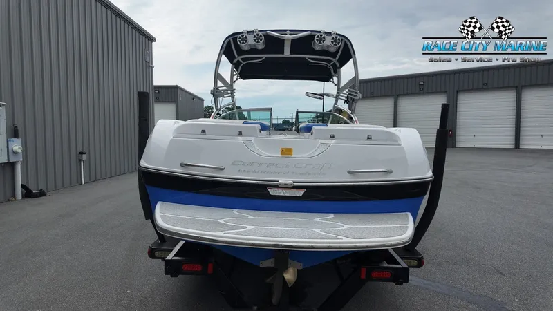 Slide: The Image of Rear view of a 2007 Correct Craft 236TE boat at Race City Marine. - 4