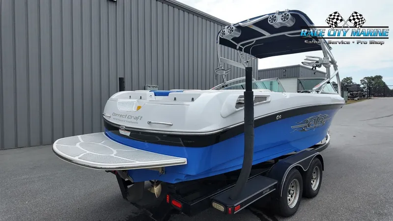 Slide: The Image of 2007 Correct Craft 236TE boat on trailer at Race City Marine. - 8