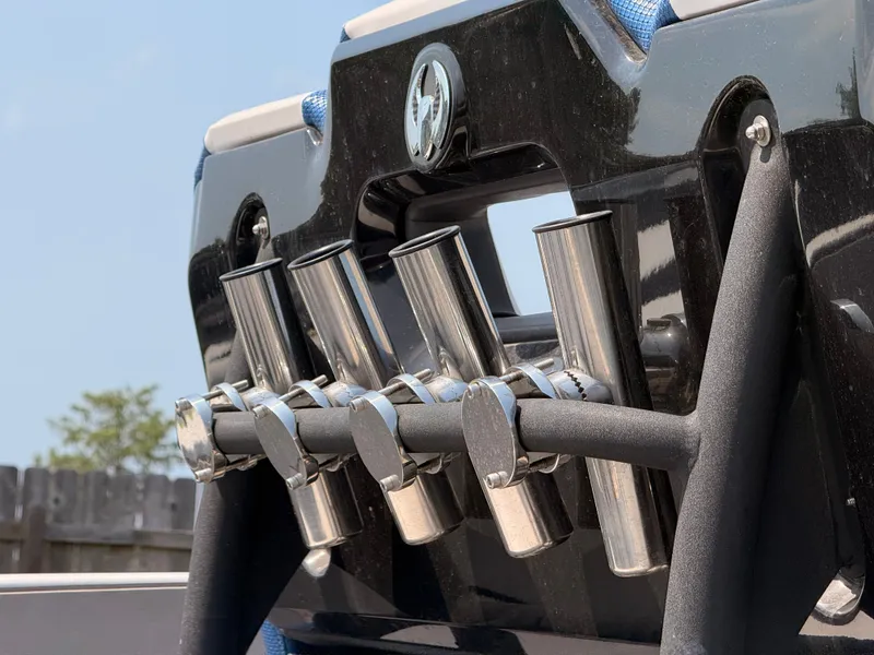 Slide: The Image of Close-up of fishing rod holders on a Scarab 255 Open ID boat. - 13