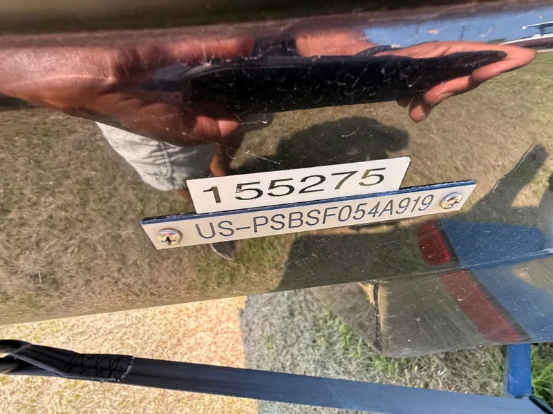 Slide: The Image of Serial number plate of a 2019 Scarab 255 Open ID boat. - 15