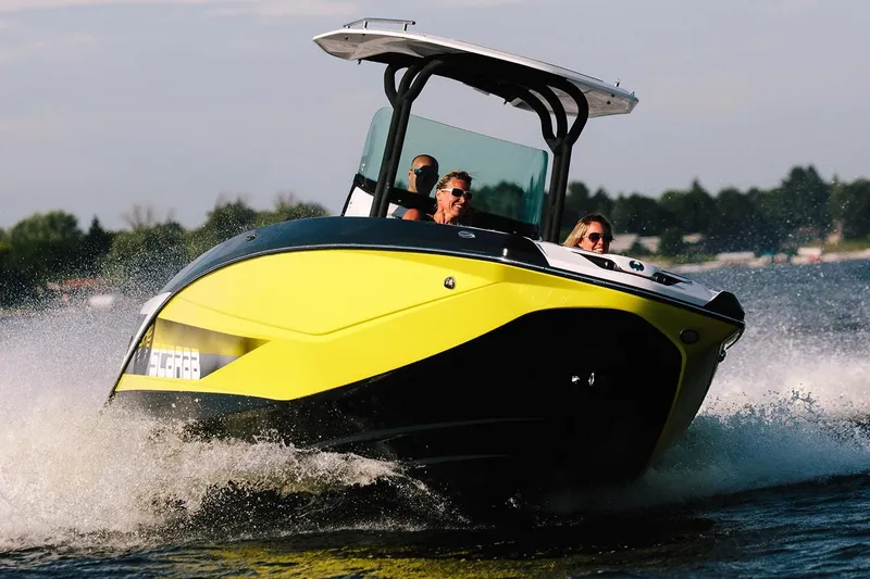 Slide: The Image of 2019 Scarab 255 Open ID boat cruising on water. - 17