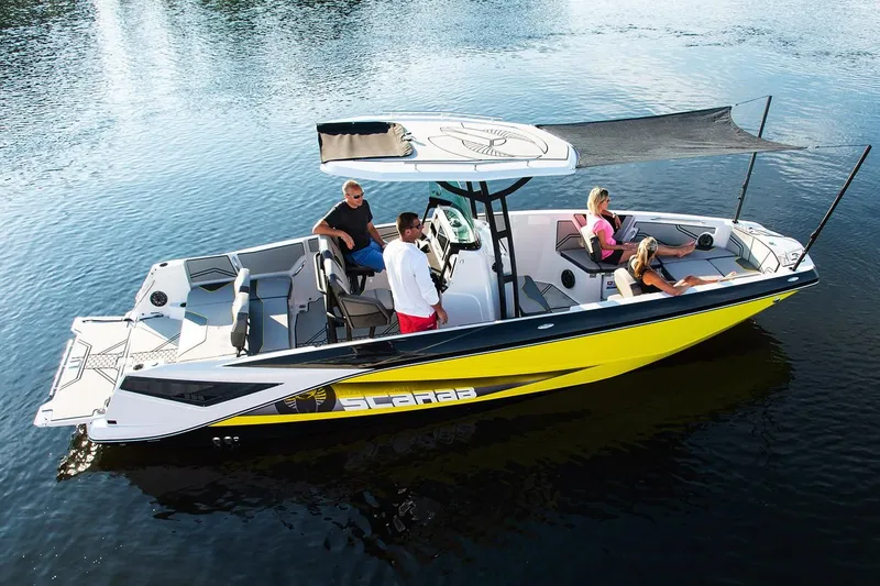 Slide: The Image of 2019 Scarab 255 Open ID boat on calm water. - 20