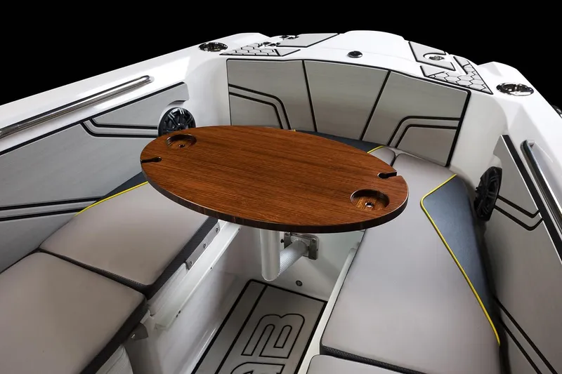 Slide: The Image of Interior of 2019 Scarab 255 Open ID with wooden table. - 24