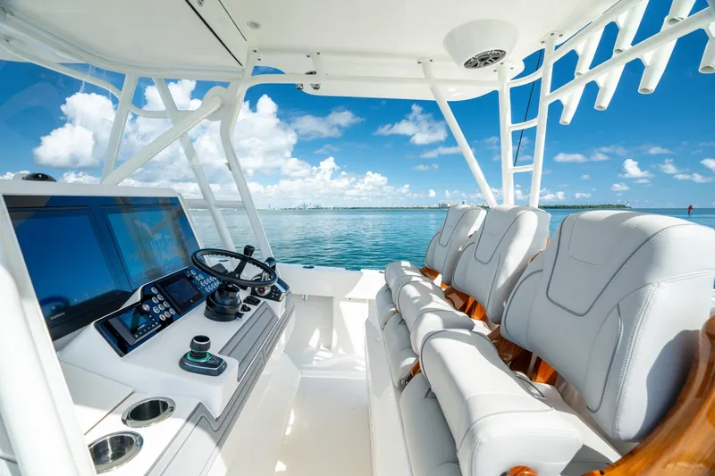 Slide: The Image of 2024 SeaVee 400Z boat interior with modern helm and luxurious seating. - 4