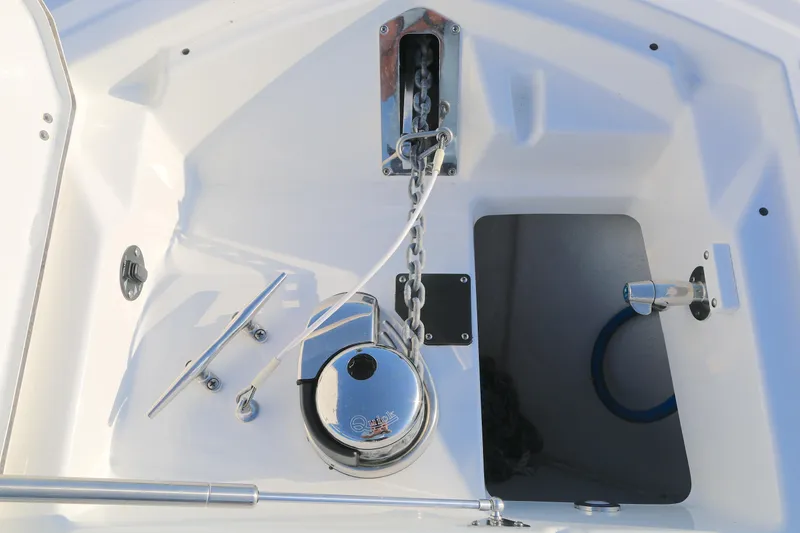 Slide: The Image of Anchor system on 2021 BLACWATER 252CC boat, featuring chain and cleat setup. - 8