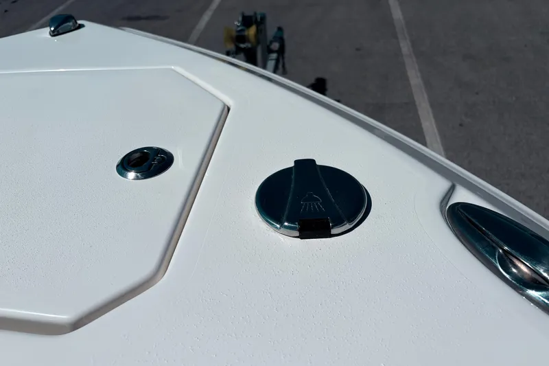 Slide: The Image of Close-up of 2026 Sailfish 252 CC boat deck with shower cap. - 13