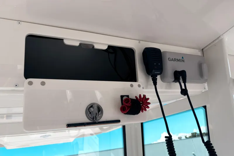 Slide: The Image of 2026 Sailfish 252 CC boat dashboard with Garmin marine electronics. - 20