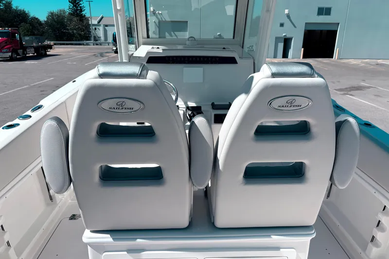 Slide: The Image of 2026 Sailfish 252 CC boat interior with dual captain seats, showcasing modern design. - 9