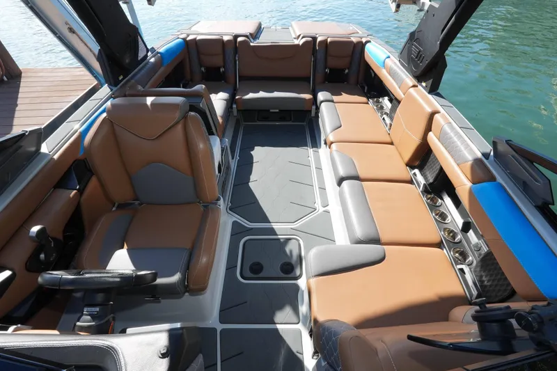 Slide: The Image of Interior of 2020 Malibu M240 boat with luxurious seating and modern design. - 35