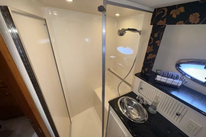 Slide: The Image of Bathroom interior of 2001 Carver 356 Motor Yacht with shower and sink. - 21