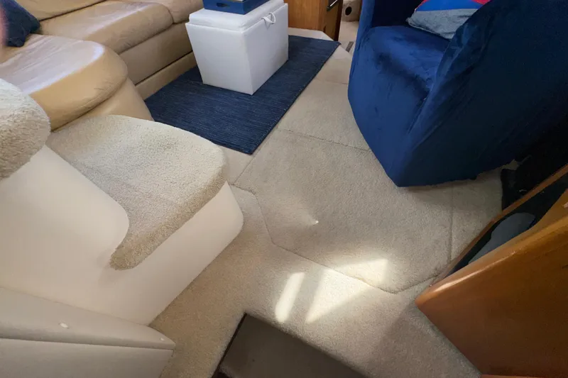 Slide: The Image of Interior of 2001 Carver 356 Motor Yacht with beige carpet. - 25