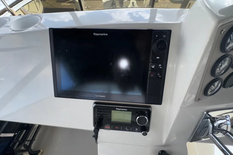 Slide: The Image of Control panel of a 2001 Carver 356 Motor Yacht with Raymarine electronics. - 27