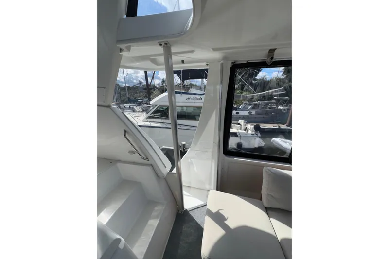 Slide: The Image of Interior view of 2001 Carver 356 Motor Yacht with marina background. - 46
