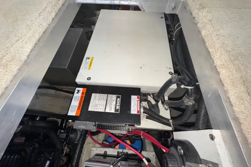 Slide: The Image of Engine compartment of a 2001 Carver 356 Motor Yacht with Kohler generator and wiring. - 55