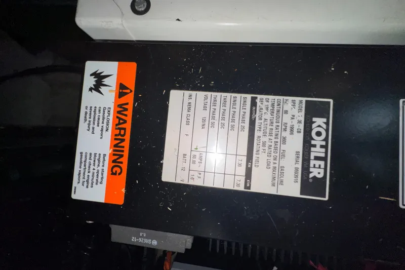 Slide: The Image of Kohler generator warning label on 2001 Carver 356 Motor Yacht engine. - 56