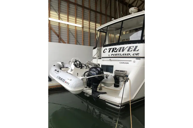 Slide: The Image of 2001 Carver 356 Motor Yacht docked with inflatable boat, Portland, OR. - 57