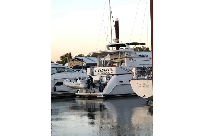 Slide: The Image of 2001 Carver 356 Motor Yacht docked at marina during sunset. - 61