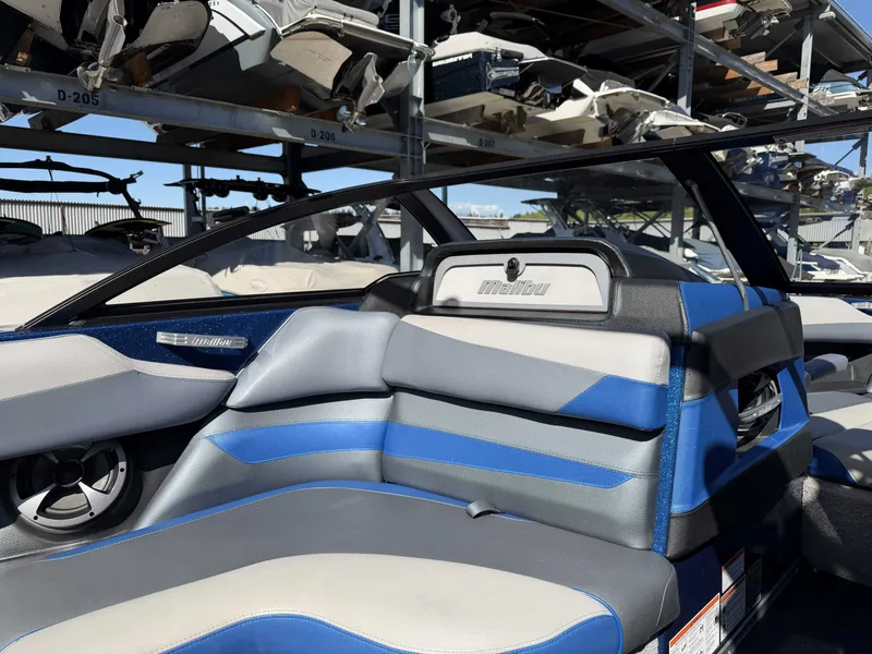 Slide: The Image of Interior of a 2017 Malibu Wakesetter 23 LSV boat, blue-gray upholstery. - 19