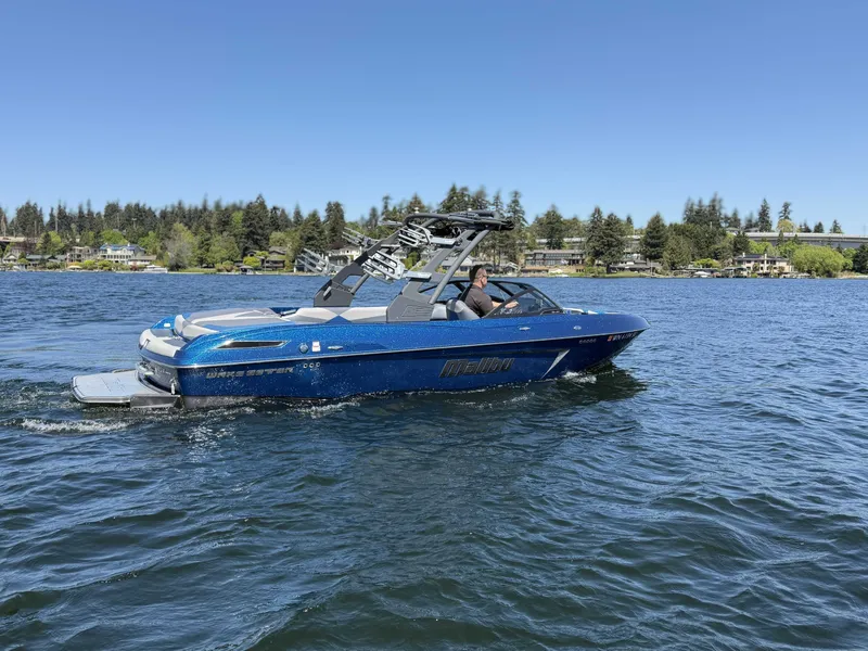 Slide: The Image of 2017 Malibu Wakesetter 23 LSV on a lake under clear skies. - 9