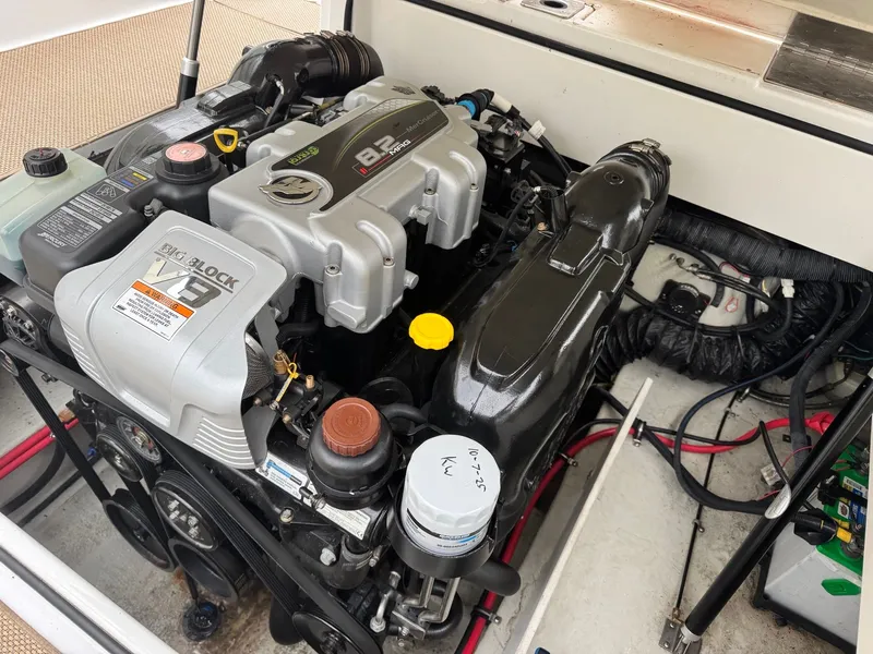 Slide: The Image of Engine compartment of a 2014 Cobalt A25 boat with Big Block V8 engine. - 13