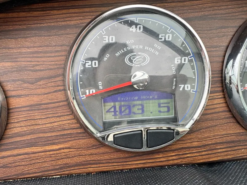 Slide: The Image of 2014 Cobalt A25 speedometer showing 403.5 engine hours. - 14