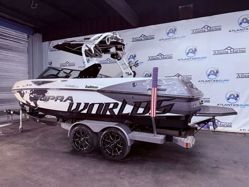 Slide: The Image of 2014 Supra SC350 boat on trailer at Atlanta Marine. - 11