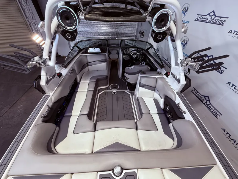 Slide: The Image of Interior of a 2014 Supra SC350 boat with luxurious seating. - 14