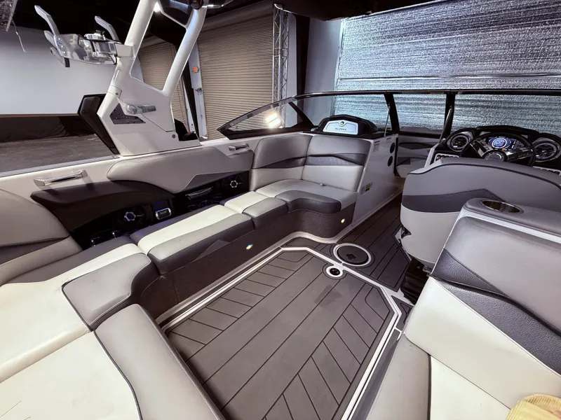 Slide: The Image of Interior of a 2014 Supra SC350 boat with luxurious seating. - 15
