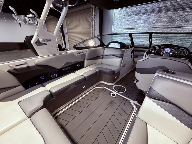 Slide: The Image of Interior of a 2014 Supra SC350 boat with luxurious seating. - 16