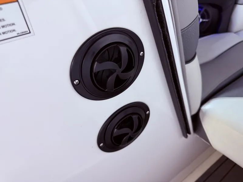 Slide: The Image of Speakers inside a 2014 Supra SC350 boat interior. - 28