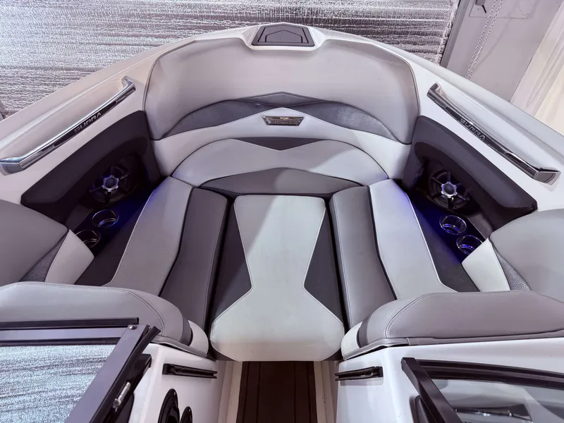 Slide: The Image of Interior of a 2014 Supra SC350 boat with gray upholstery. - 33