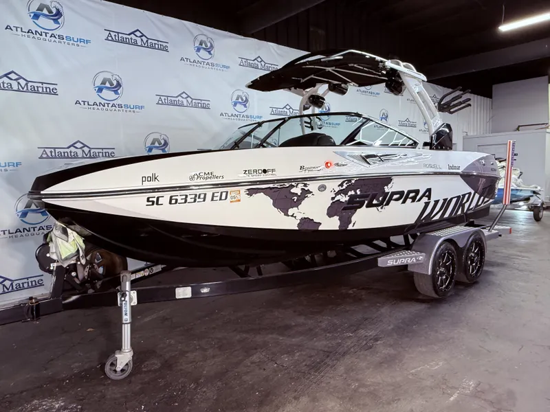 Slide: The Image of 2014 Supra SC350 boat displayed at Atlanta Marine. - 7
