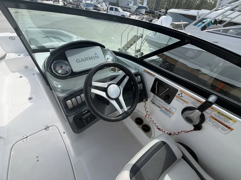 Slide: The Image of Interior view of a 2020 Hurricane 2400 SD boat with Garmin navigation system. - 20